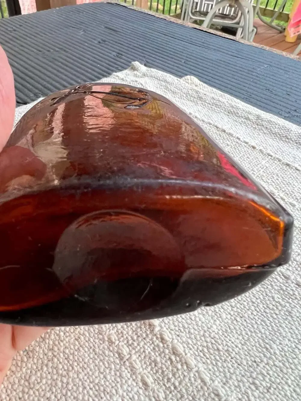 Antique Amber Glass Strap-Sided Whiskey Flask with Embossed Anchor